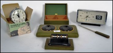 A collection of vintage retro 20th century items to include a retro alarm clock with a full front