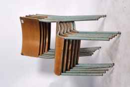 A set of six 1950 / 60's steel tubular stacking chairs with panel seats and backs