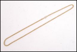 A 9ct gold / 375 marked ladies rope twist necklace uniting with clasp. Measures 46cms long  / 3.2g