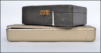 A collection of vintage doctors apparatus to include blood pressure monitor, Hypodermic needles