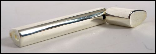 A good silver plated toothpick holder with hinged cap and lined interior complete with wooden picks.