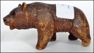 An early 20th century carved Black Forest bear sta