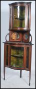 An Edwardian mahogany inlaid upright corner display cabinet having glass cabinet over gallery with