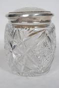 A sterling silver lidded lead cut crystal glass jar with enamel armorial Royal coat of arms of the