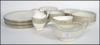 A Royal Doulton part service in the ' Berkshire ' pattern consisting of plates, side plates,