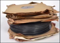A collection of 78rpm records featuring various artists and genres to include Guy Mitchell, Pat