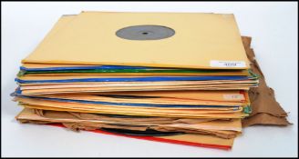 A collection of vintage 78rpm records to include several artists and ganres such as Elvis, Georgia