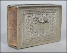 A continental / Indian silver matchbox holder depicting an elephant to one side and lion to the