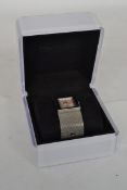 A ladies contemporary DKNY wristwatch complete in the original presentation case with booklet. The