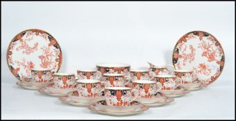 A good Royal Crown Derby Imari pattern tea service comprising cups, saucers, plates, sandwich