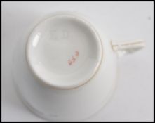 A believed 19th century porcelain tea service bear