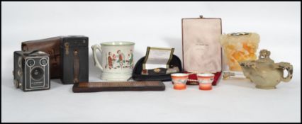A collection of items to include a ceramic cider mug with a toad to the base, a pair of Japanese