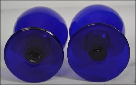 A pair of 19th century Victorian Bristol Blue glas