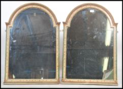 A good pair of Regency revival wall mirrors circa mid 20th century having arched tops with painted