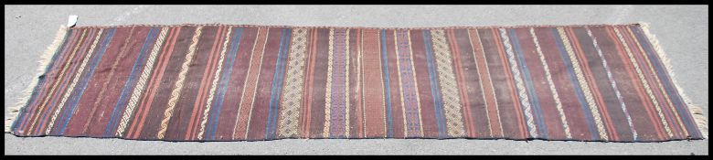 A large Afghan / Persian Balouch Kilim runner rug