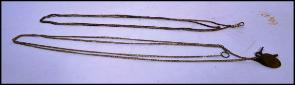 Two vintage 20th century large Albert pocket watch chains, one with two coin fobs with pocket