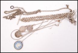 A good collection of silver necklaces with pendant