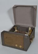 A vintage 20th BSR record player set in a two tone