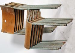 A set of six 1950 / 60's steel tubular stacking chairs with panel seats and backs