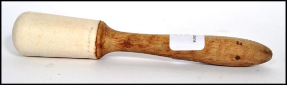 A Wedgwood 'Best Composition' mortar, of typically circular form with lipped rim, together with a