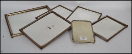 A collection of 6 Italian early 20th century shop display counter / haberdashery wall mirrors.