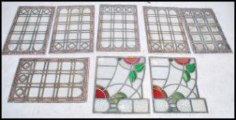 A group of 19th century stained glass lead framed panels to include 6 matching plain panels with