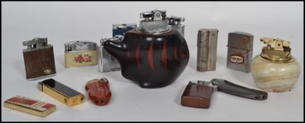 A collection of vintage lighters and table lighters to include Embassy, Polo, Sim, Calibri