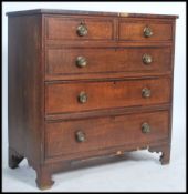 A 19th century Georgian mahogany chest of drawers having cross branded borders raised on bracket