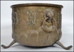 A 19th century copper coal / log box raised on hai