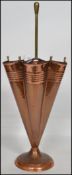 A vintage 20th century copper and brass umbrella s
