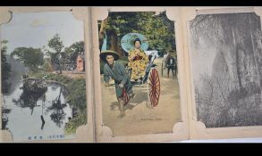 Antique Japanese lacquered concertina type postcard album containing 24 vintage cards of Japan (