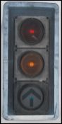A large set of Industrial traffic lights complete with the blinker hoods and raised on tall