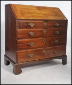 A Georgian Mahogany bureau, circa 1800, the banded fall front opening to reveal a fully fitted