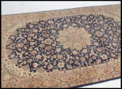 A 20th century decorative finely woven Persian / Islamic floor carpet rug having geometric