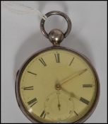 A silver hallmarked cased fusee key wind pocket watch with enamel dial having Roman numeral batons