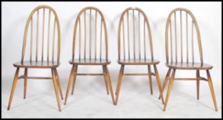 A set of four Ercol Golden Dawn coloured beech and elm framed Windsor, high hoop, spindled back