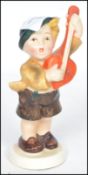A rare believed unlisted 20th century Goebbels Hummel ceramic figurine of a boy playing a mandolin
