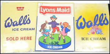A collection of 3x vintage seaside ice cream advertising signs for Lyons Maid & Wall's Ice Cream.