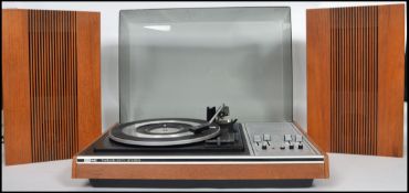 A stunning  vintage retro ITT KB twelve fifty stereo  Record Player with a pair of matching teak