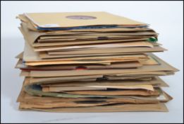 A collection of vintage 78rpm records dating from the early 20th century featuring many different