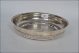 A large silver hallmarked Egyptian bowl chase decorated dating to circa 1941-43 with Cairo assay