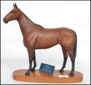 A good 20th Beswick model of ' Arkle ', from the connoisseur range with name card reading Champion