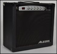 A vintage Spitfire 60 digital guitar amp by Alesis