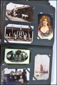 Early collection of some 300 postcards in old style album. Very interesting range of cards: