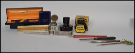 A 20th century Waterman  18ct nib fountain / ink pen together with a collection of Waterman