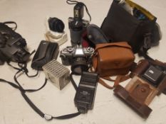 A collection of vintage cameras dating from the 20th century to include a Zeiss Ikon Ikonta