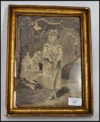 A 19th century framed and glazed silk picture possibly Irish in origin having a women to the for