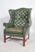 A superb 20th century, Edwardian / 1920's style full grain leather Chesterfield armchair.