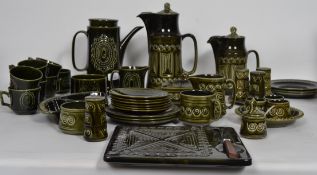 A collection of vintage retro 20th century ceramics by various makers, all finished with a green