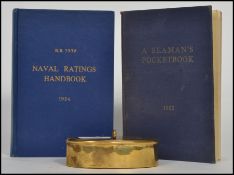 An early 20th century First World War trench art brass lidded pot with snakeskin lining.